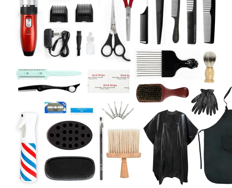 The barber kit included in the enrollment fee: clippers, guards, shears, combs, brushes, razor, cape and gloves