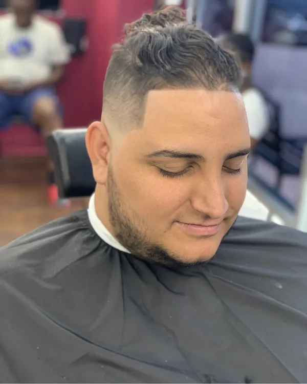 A high fade with a crisp line-up, side view