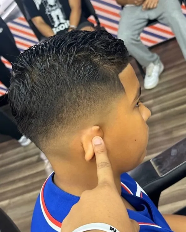 A young client's fade and line-up