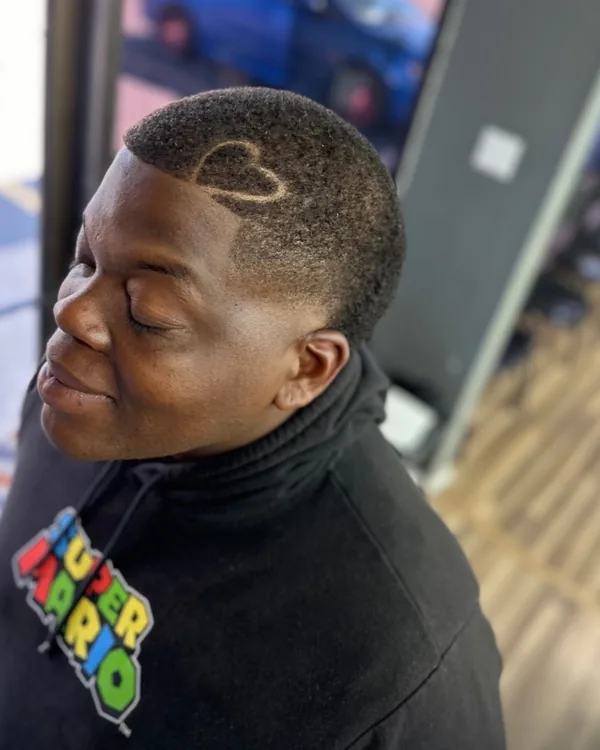 A design cut into the back of a client's head